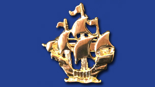 A gold Blue Peter badge