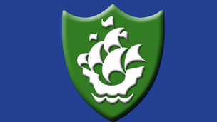 A green Blue Peter badge
