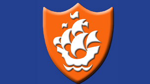 An orange Blue Peter badge