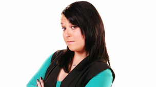 Dani looks over her shoulder.