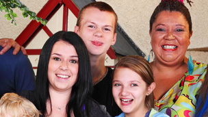 Dani as Tracy with some of the younger cast members.