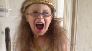 Autumn Rose as a cave girl