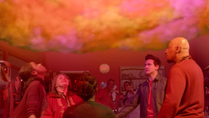 The wizards combine their powers to summon the Source of all Magic.