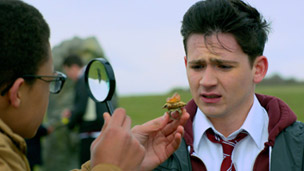 Tom and Benny holding a magic ring