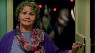 ursula opening the door to the chamber