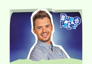 blue peter presenter barney harwood holding a camera