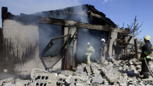 Последствия обстрела в Новоазовске