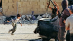 Menino ator trabalha em filme sobre a Síria                    (foto: Lars Klevberg)