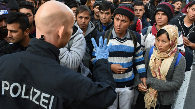 polisi hjerman dan migran